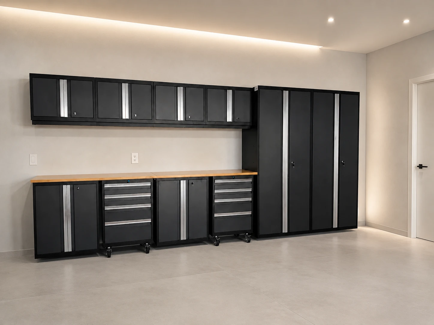A finished garage with custom black storage cabinets and workbench